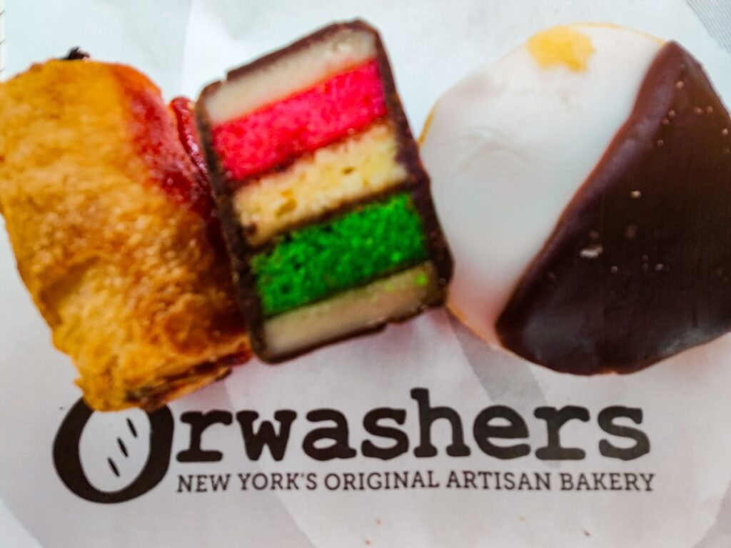 Raspberry rugelach, a tri-color cookie, and a black and white cookie from Orwashers. 