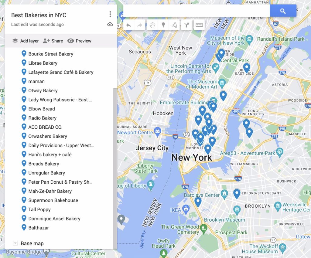 Map of the best bakeries in new York City with 23 blue dots to represent the bakeries.  