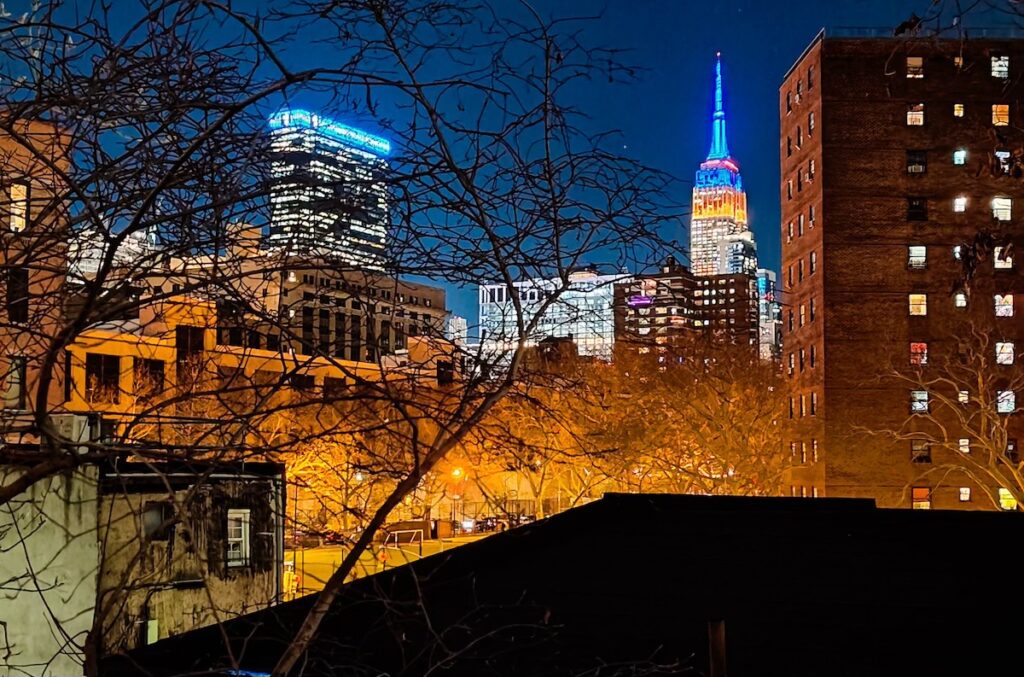 View of the Empire State Building from the High Line in the evening. 