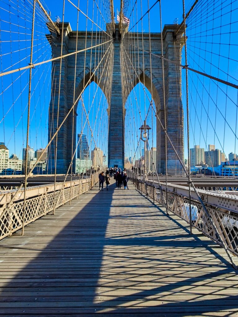 View of the double arches associated with the Brooklyn Bridge on a nice, sunny day. 