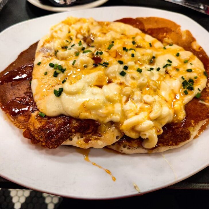 Aerial view of pancakes with maple syrup and mac and cheese from Mom's.