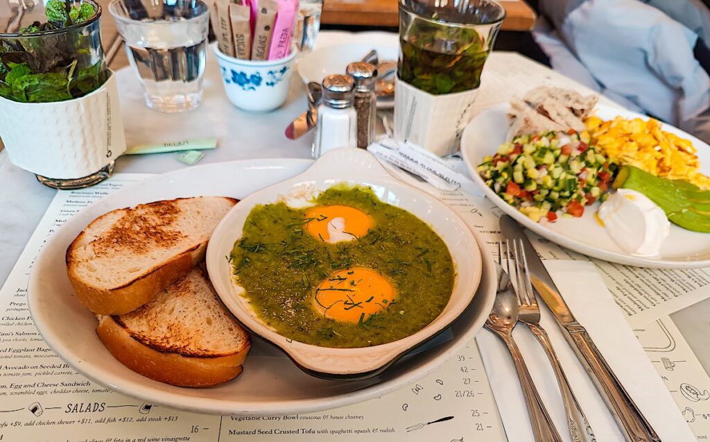 View of the eggs and green shakshuka on offer for brunch at Jack's Wife Freda. They serve the best Easter brunch in NYC. 